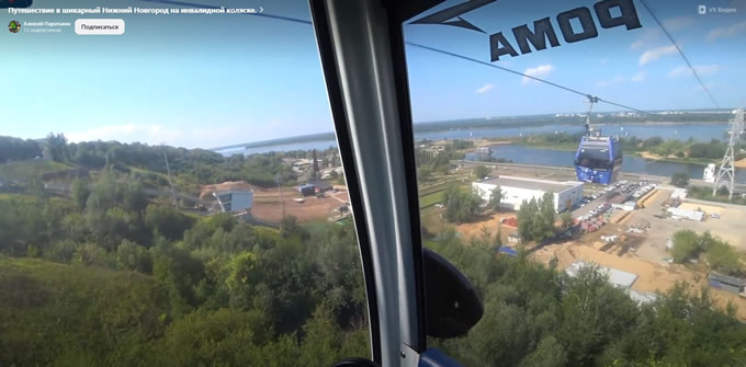 инвалидная электро коляска в кабинке Нижегородской канатной дороги через Волгу